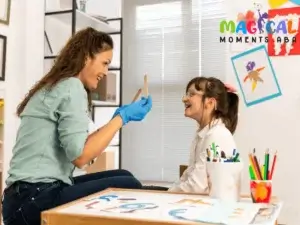 Therapist using flashcards to teach a child during ABA session